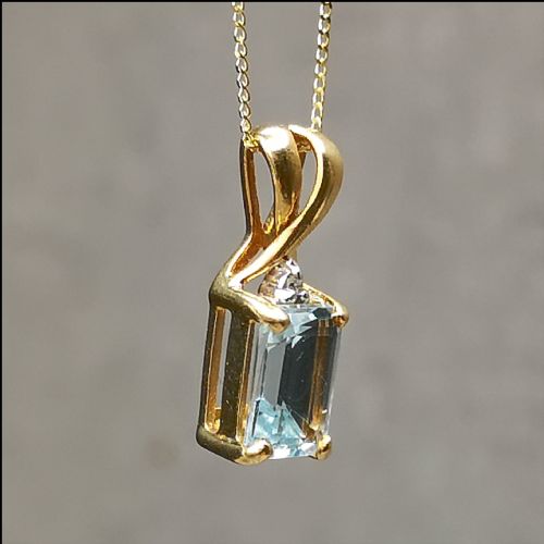 9ct Gold Emerald Cut Blue Topaz & Diamond Necklace