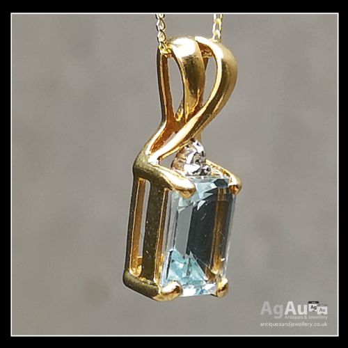 fig 1. 9ct Gold Emerald Cut Blue Topaz & Diamond Necklace