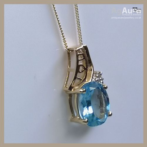 fig 1. 9ct Gold Blue Topaz (3ct) & Diamond Pendant Necklace