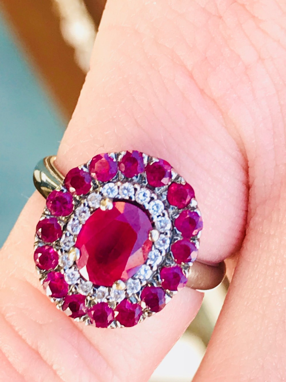 A beautiful Art Deco 18ct white gold ruby and diamond cluster ring View II