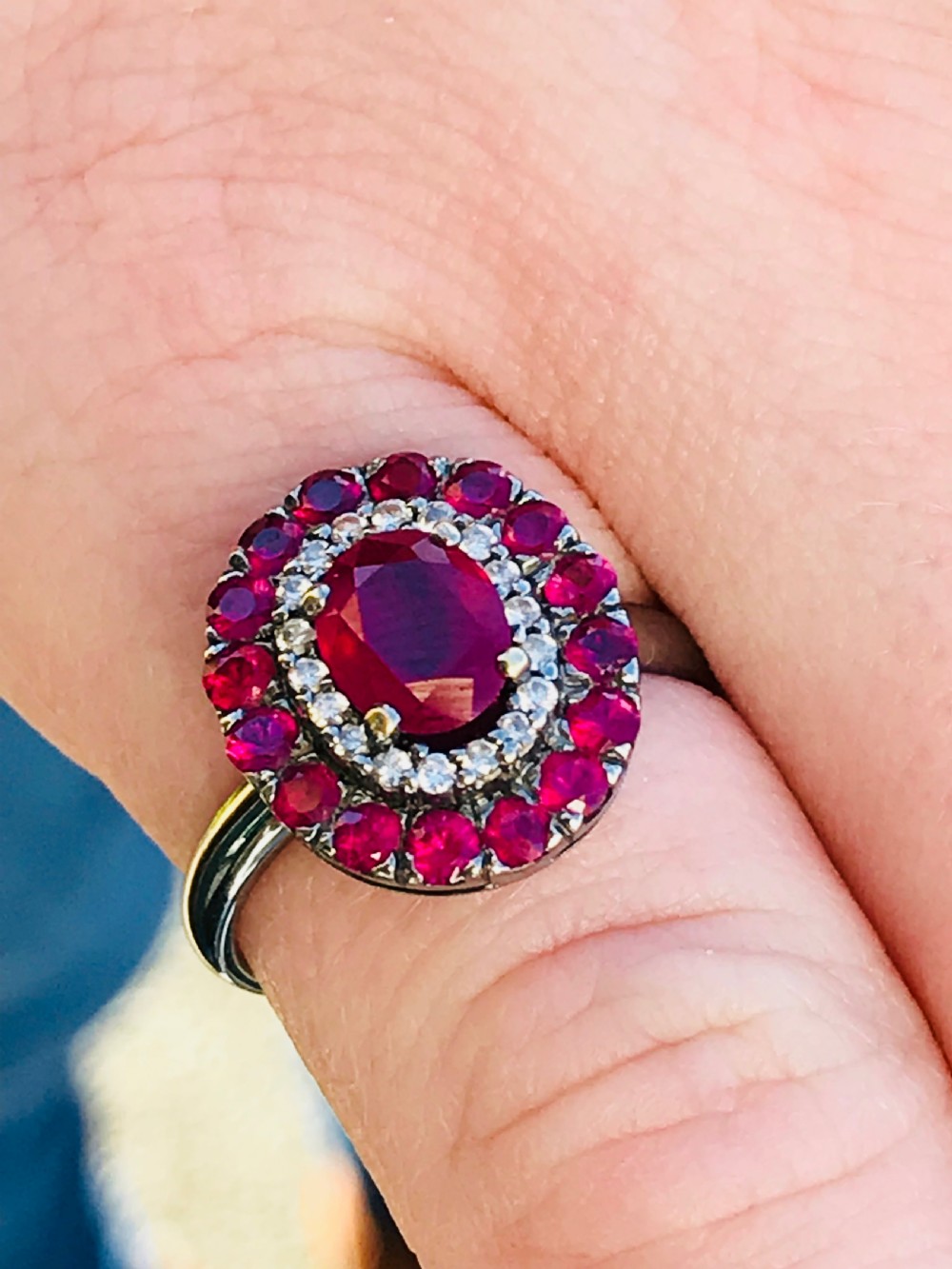 A beautiful Art Deco 18ct white gold ruby and diamond cluster ring View IV