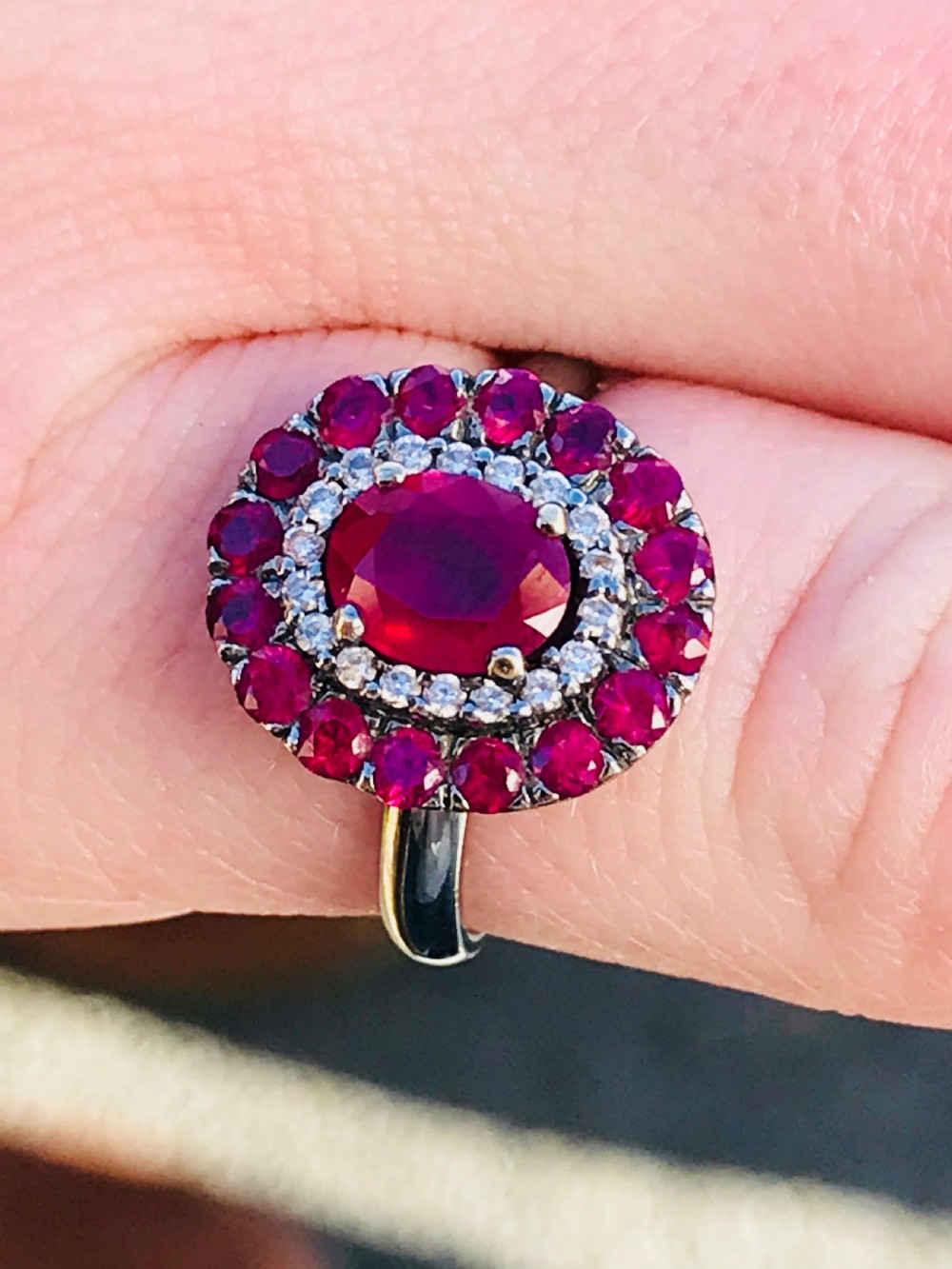 A beautiful Art Deco 18ct white gold ruby and diamond cluster ring View VI