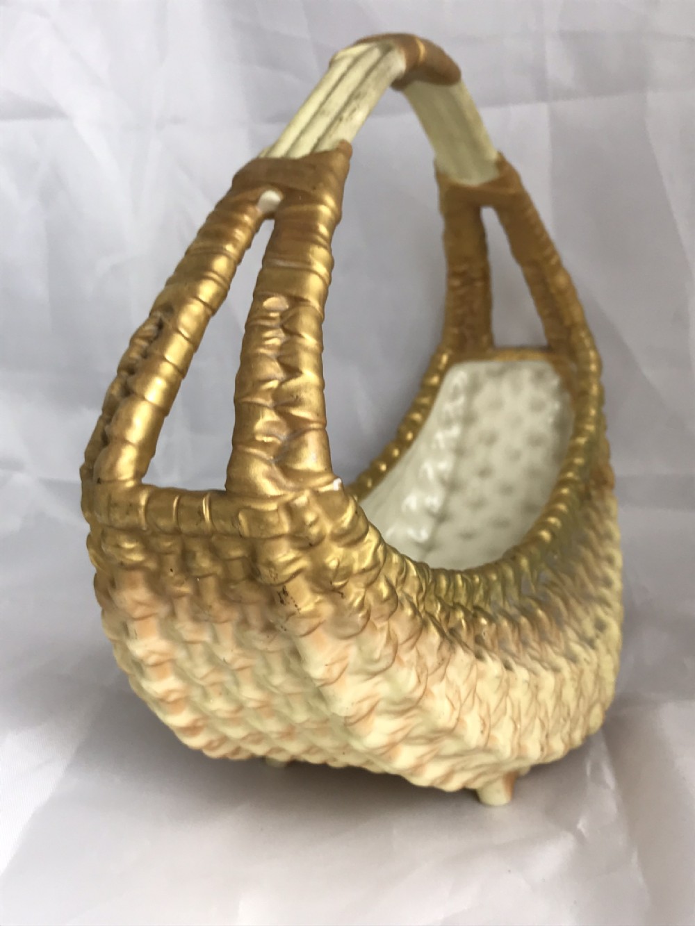 A large Royal Worcester Blush Ivory Guiled Potpourri Basket Dated 1911