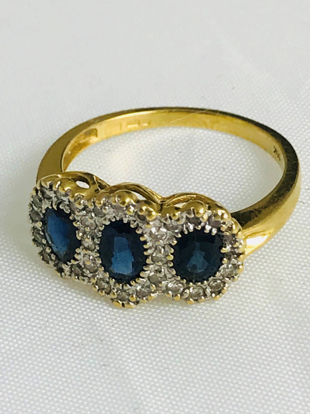 A stunning 18ct Gold Sapphire and Diamond Ring. size N View II
