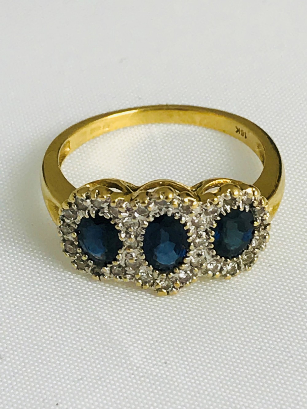 A stunning 18ct Gold Sapphire and Diamond Ring. size N View III