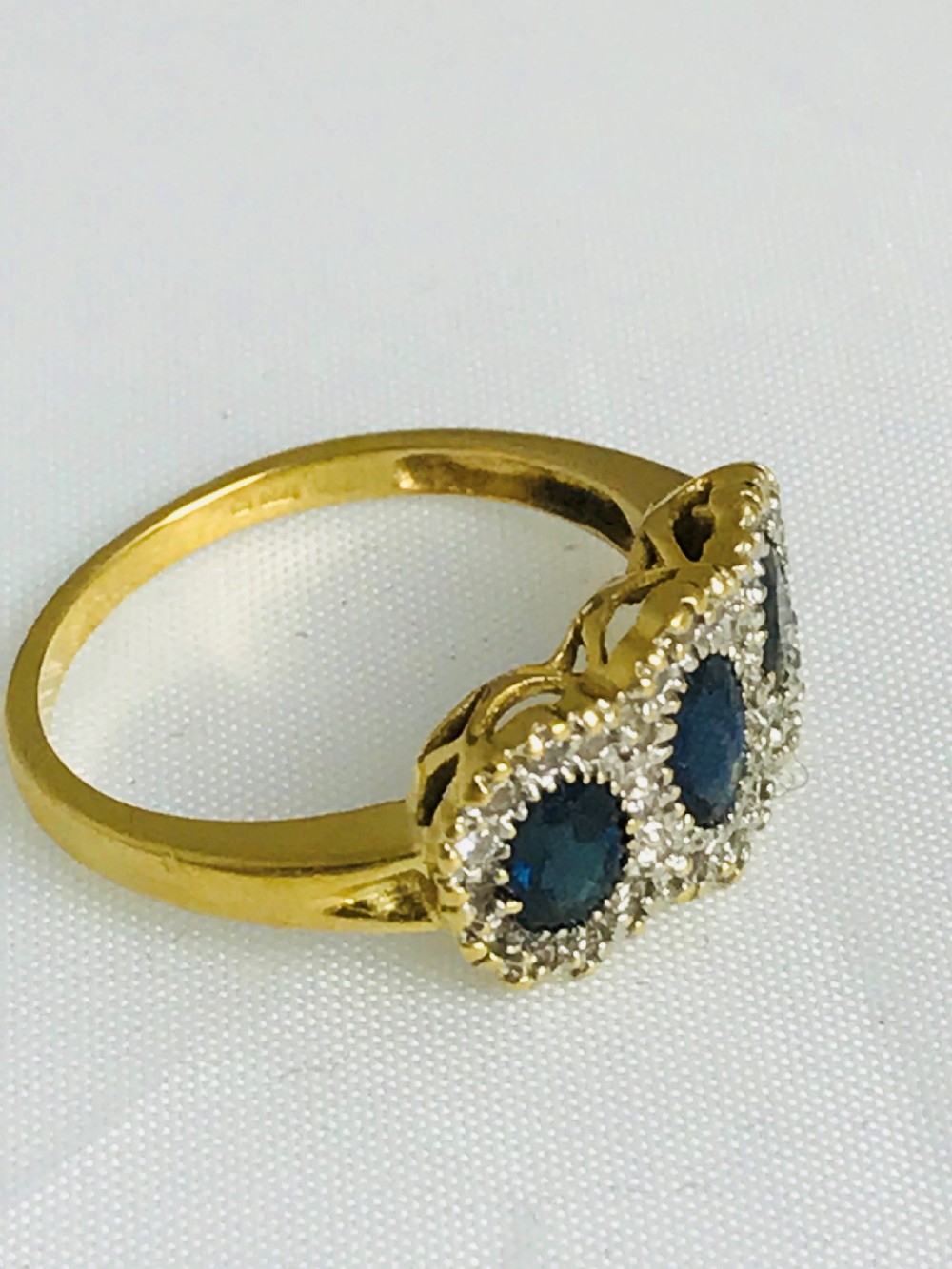A stunning 18ct Gold Sapphire and Diamond Ring. size N View V