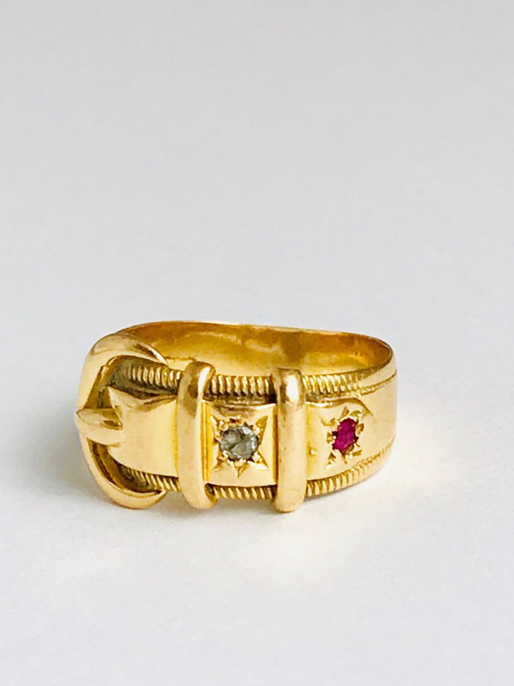 Antique Victorian 1897 18ct Buckle Ring  with a Diamond and Ruby. Size L
