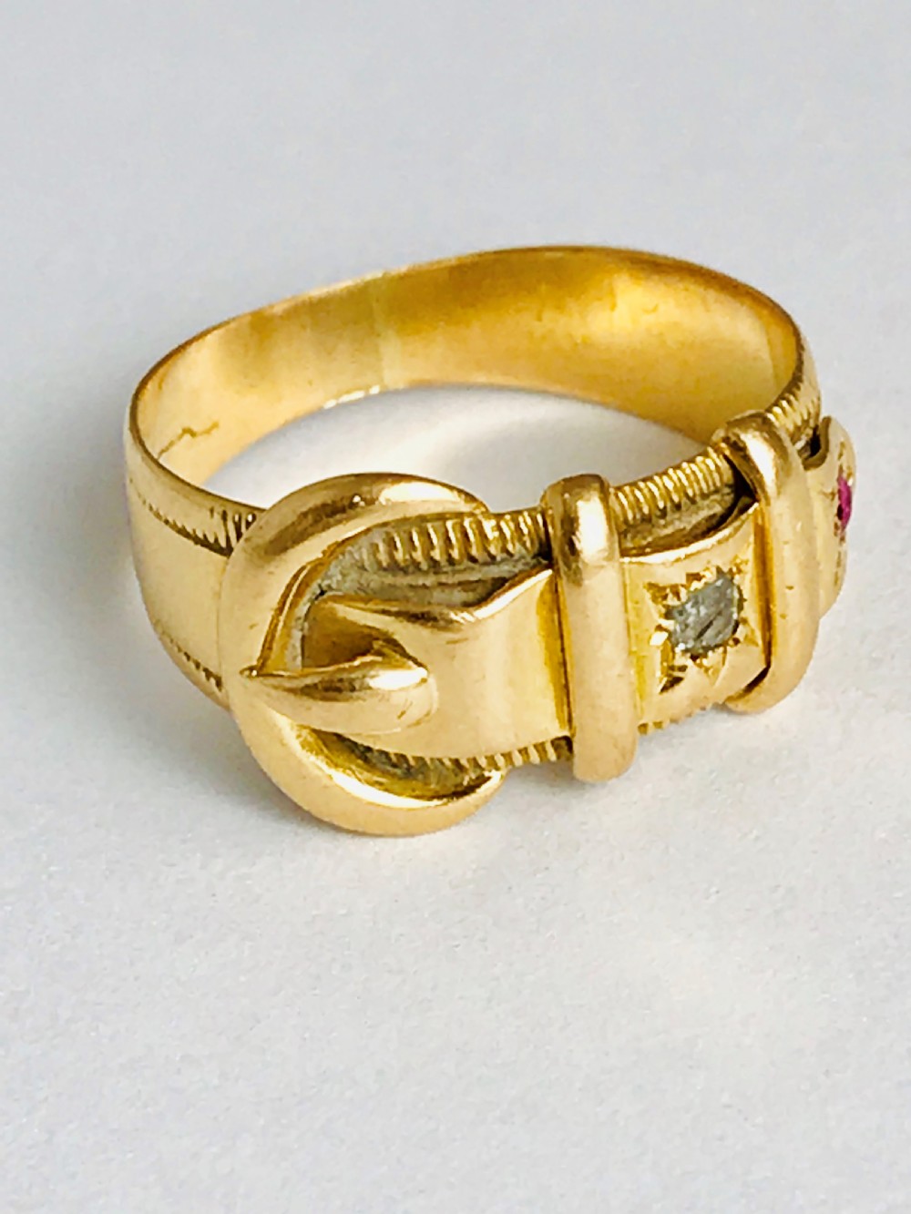 Antique Victorian 1897 18ct Buckle Ring  with a Diamond and Ruby. Size L
 View VI