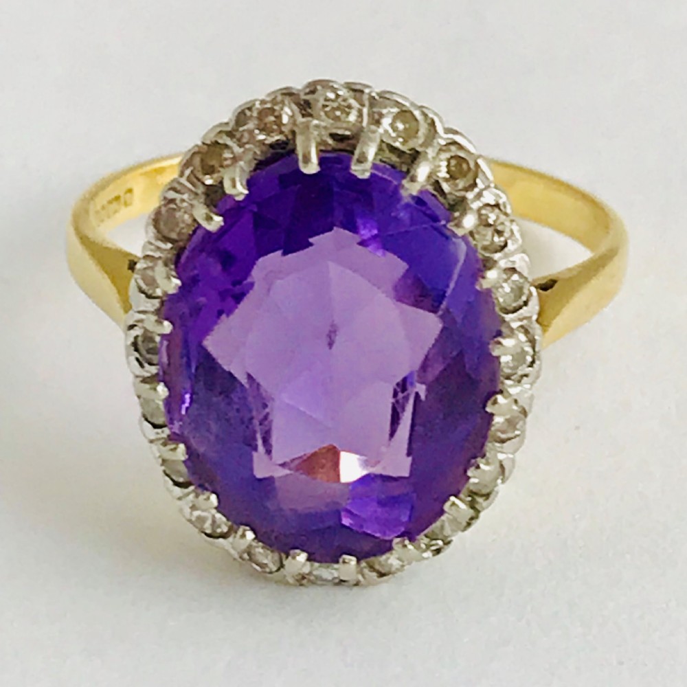 A Large Violet 8ct Amethyst Surrounded by Diamonds
