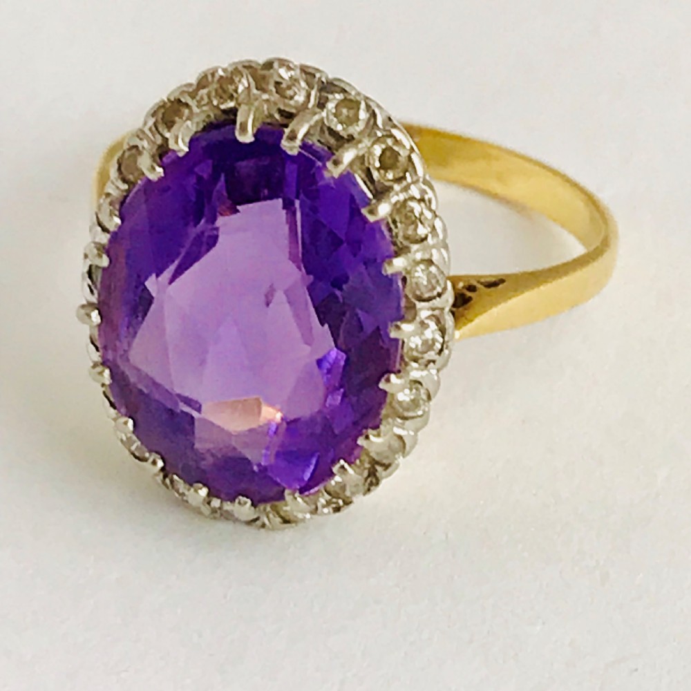 A Large Violet 8ct Amethyst Surrounded by Diamonds
 View II