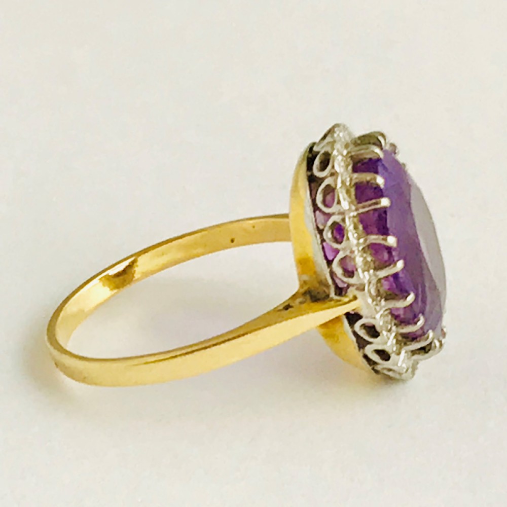A Large Violet 8ct Amethyst Surrounded by Diamonds
 View V