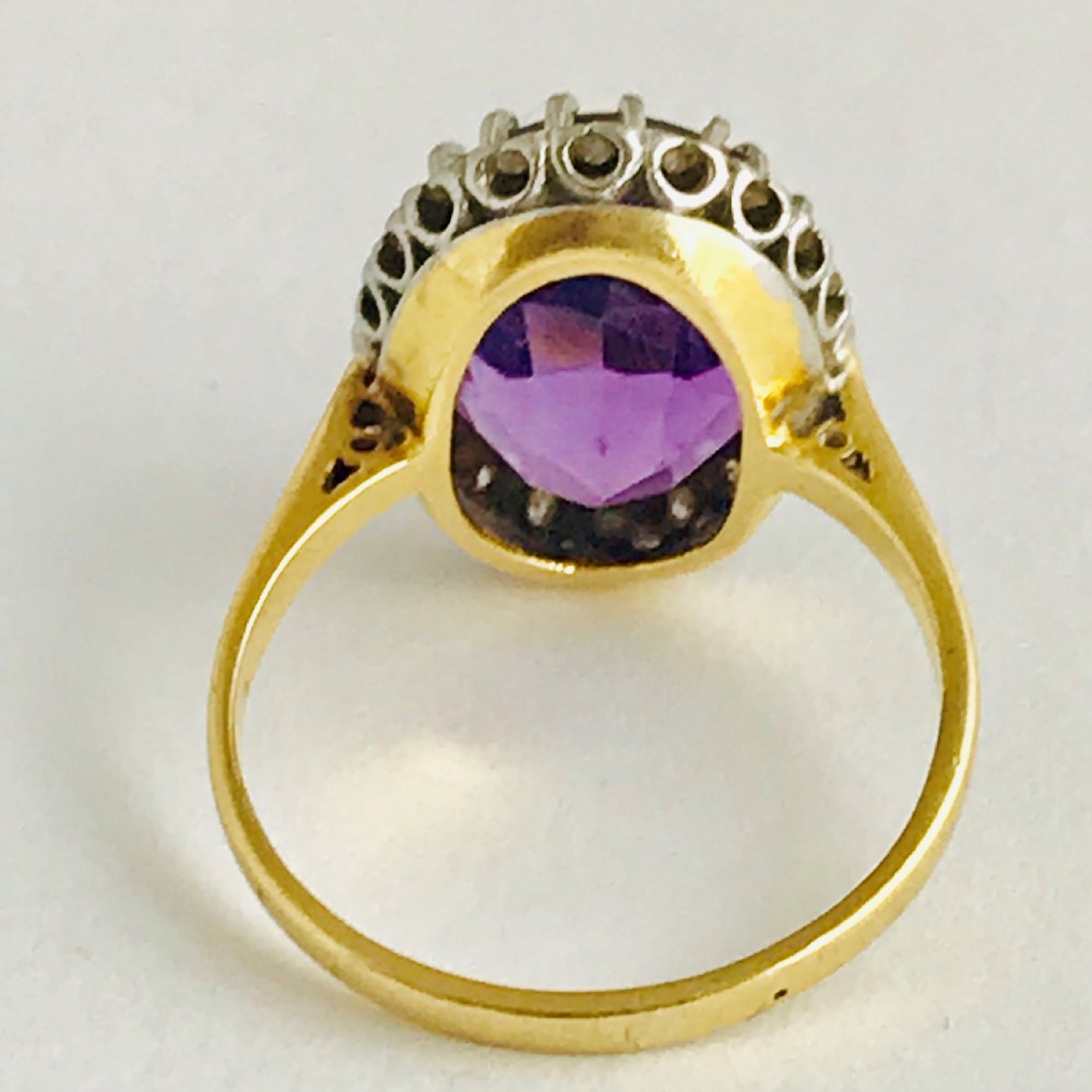 A Large Violet 8ct Amethyst Surrounded by Diamonds
 View VI