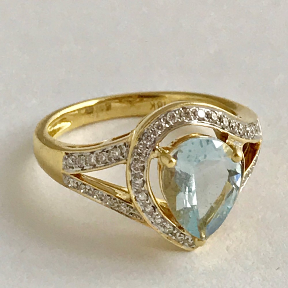 An Art Deco 3ct Aquamarine with 0.5ct of Diamonds ring set in 18ct yellow gold View II