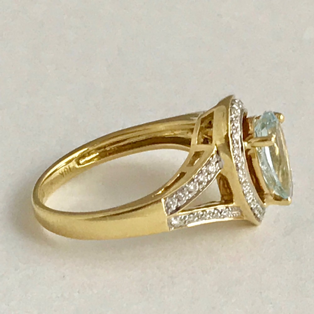 An Art Deco 3ct Aquamarine with 0.5ct of Diamonds ring set in 18ct yellow gold View IV