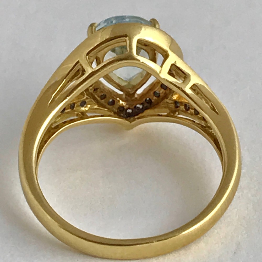 An Art Deco 3ct Aquamarine with 0.5ct of Diamonds ring set in 18ct yellow gold View VI