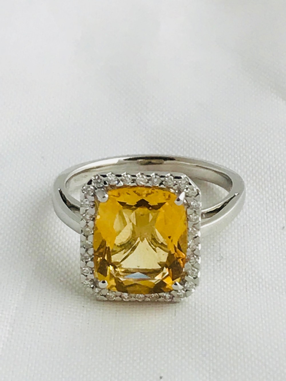 Stunning 18 carat white gold citrine and diamond cluster ring