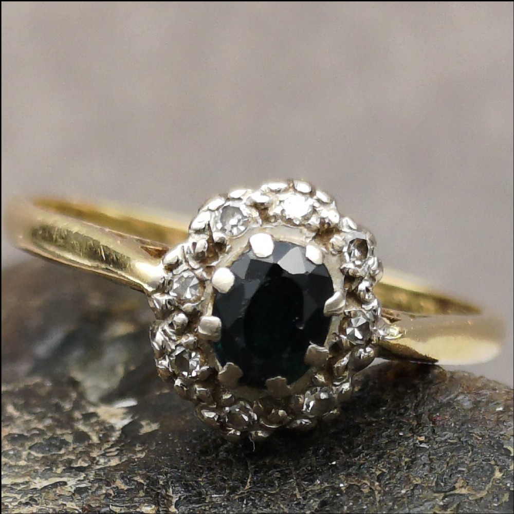  Pretty 18ct gold sapphire and diamond ring