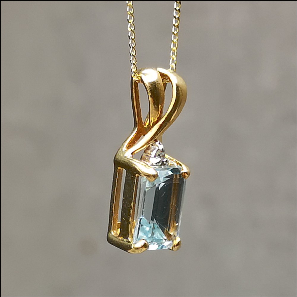 9ct Gold Emerald Cut Blue Topaz & Diamond Necklace