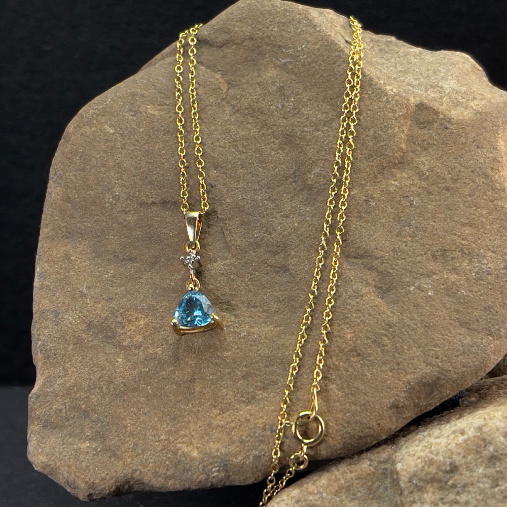 9ct Gold Diamond & Blue Topaz Pendant Necklace
 View IV