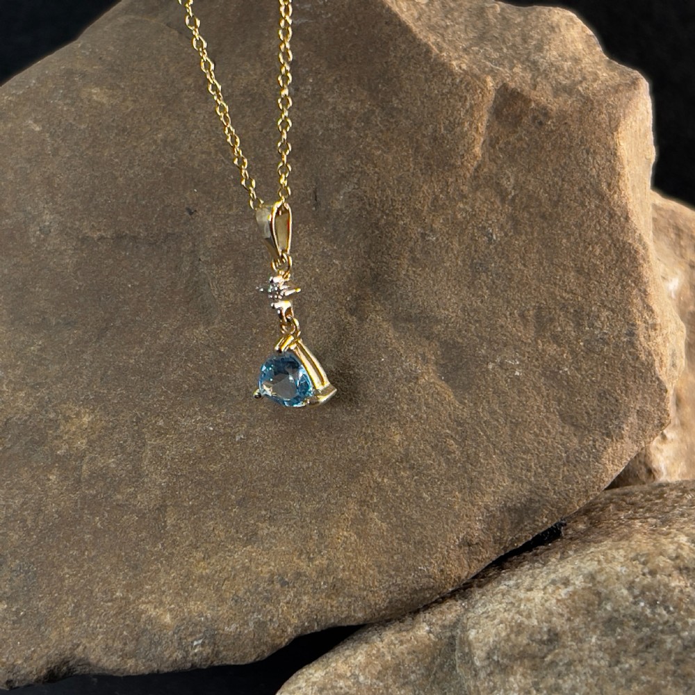 9ct Gold Diamond & Blue Topaz Pendant Necklace
 View VI