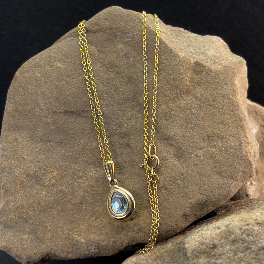 9ct Gold Blue Topaz Pendant Necklace
 View V