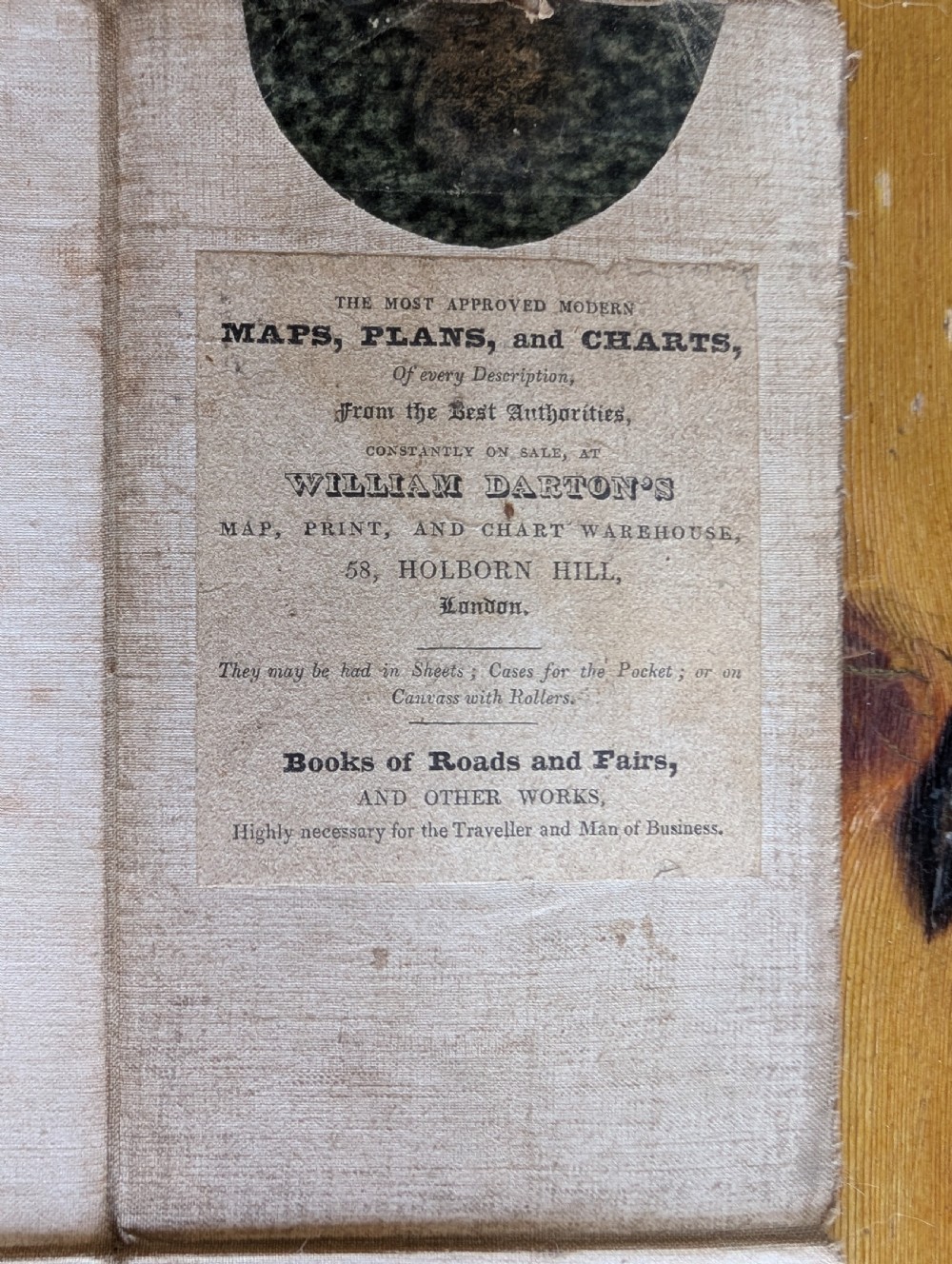 An antique printed paper pocket map of London in a dark slipcase titled The Strangers Guide Through the Streets of London by Saml. Ward. View VI
