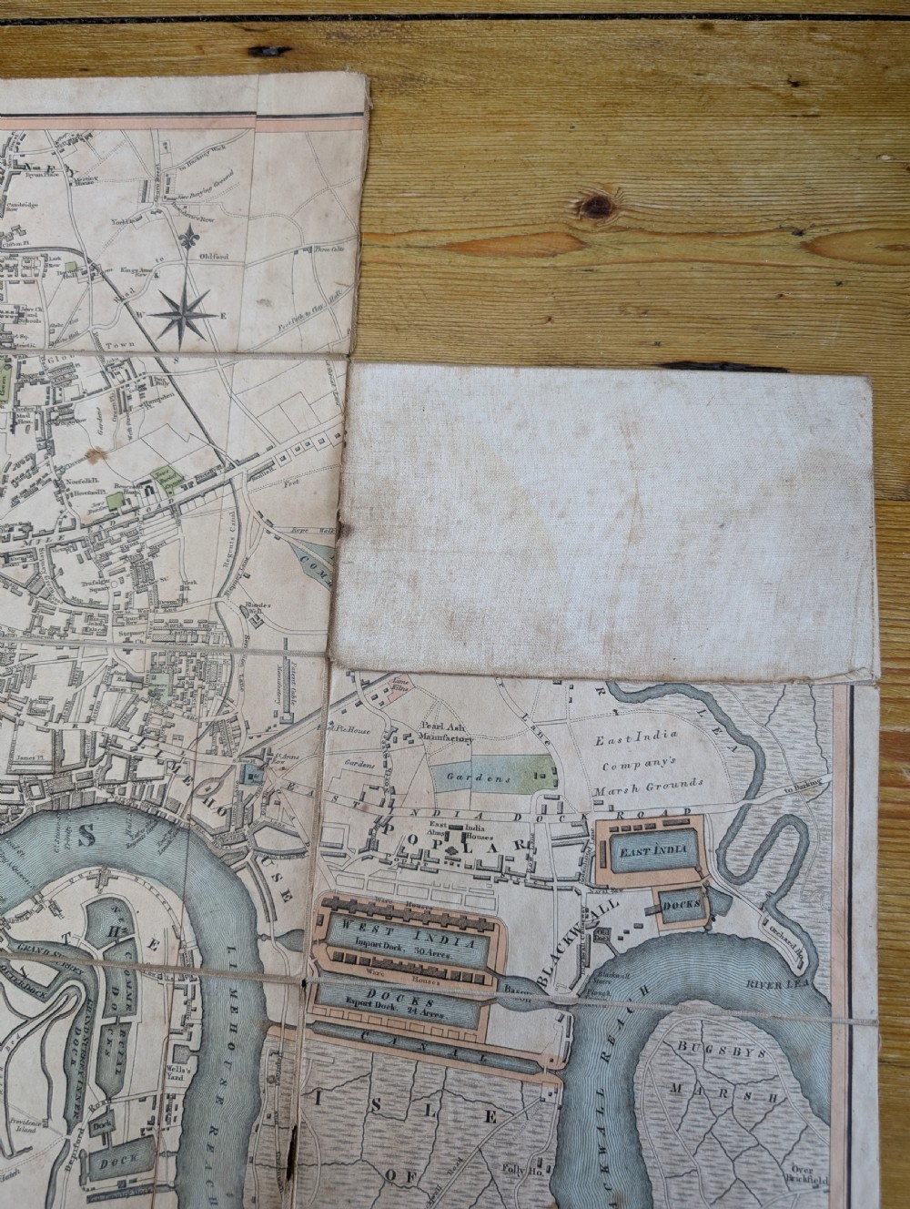 An antique printed paper pocket map of London in a dark slipcase titled The Strangers Guide Through the Streets of London by Saml. Ward. View VIII