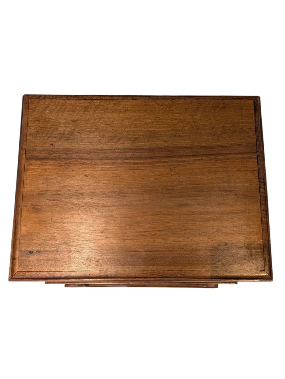 An antique dark wood bedside cabinet featuring an open upper compartment, a lower single door cupboard with marquetry detail, white line inlays, and short curved legs. View VII