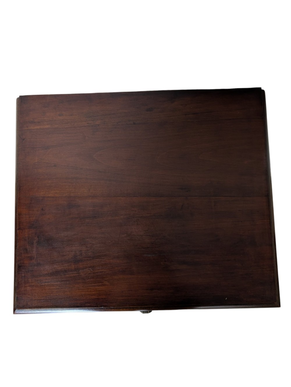 A dark brown walnut Art Deco bedside cabinet featuring a top drawer, an open central shelf, a cupboard door with geometric veneer inlay, and hexagonal metal knobs. View IX