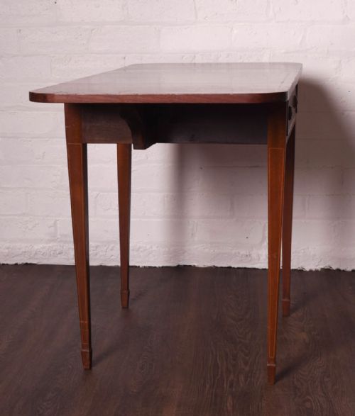 fig 3. Mahogany drop leaf Pembroke table of small proportions