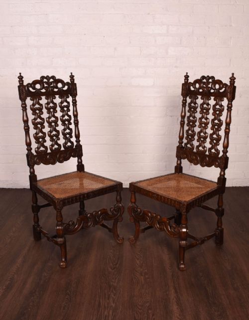 fig 1. An elaborate pair of carved hall chairs