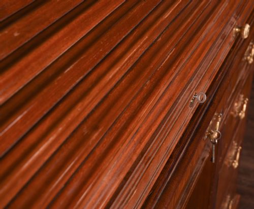 fig 1. Stunning mahogany roll top desk by maple and co london