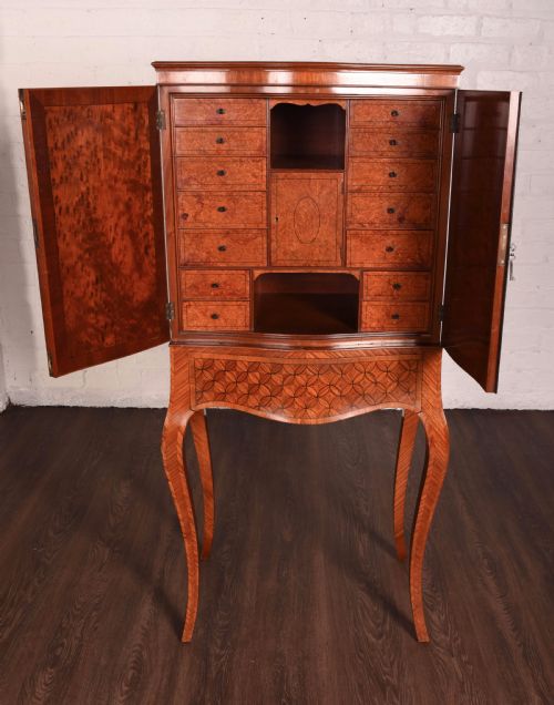 A Exhibition Quality Satin Wood Collectors Cabinet on Stand
