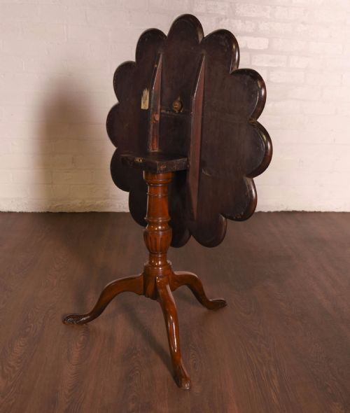 fig 2. A mahogany tilt top tripod table