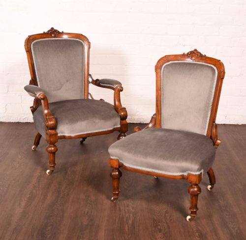 A Matching Pair of Walnut Victorian Ladies and Gents Chairs