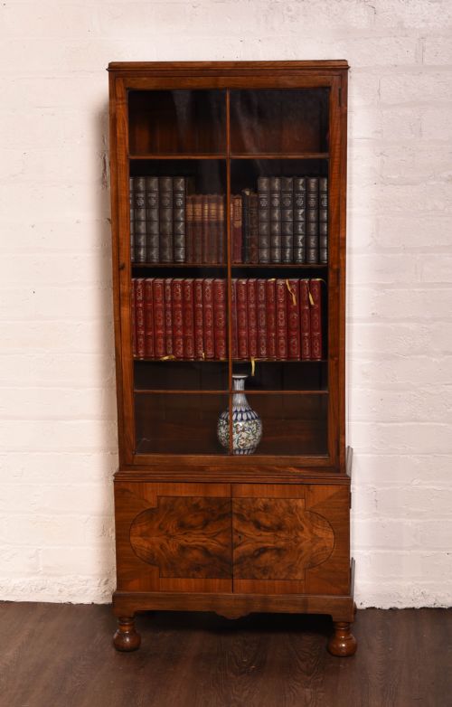 A Neat Walnut Single Door Glazed Bookcase