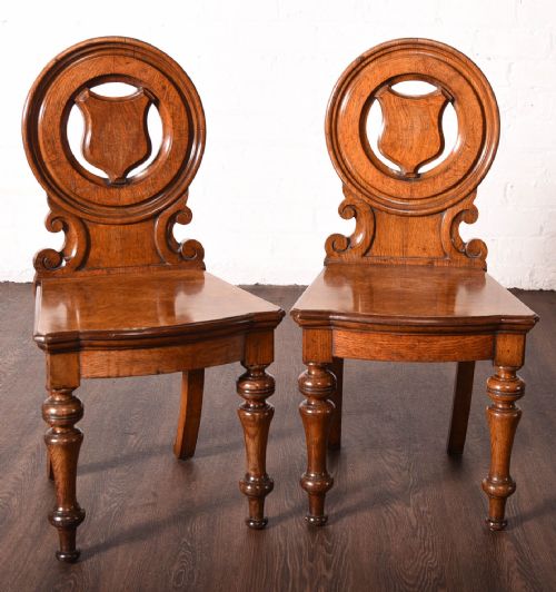 Pair of Pollard Oak Hall Chairs by George Ashworth of Leeds