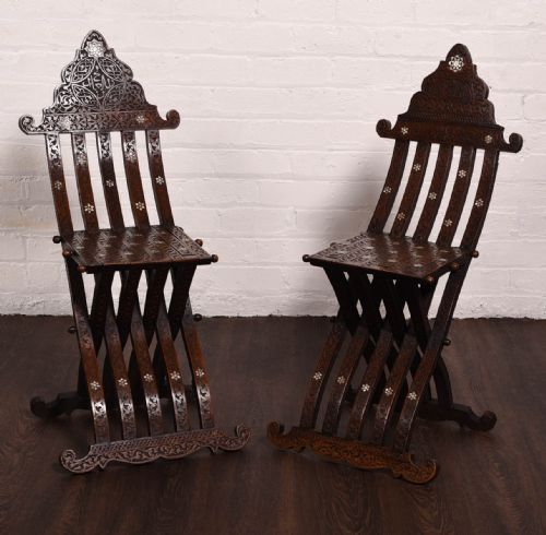 A Rare Pair Late 19th Century Islamic Carved Folding Chairs