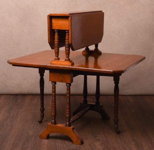 An Unusual Edwardian Walnut Double Sutherland Dropleaf Table