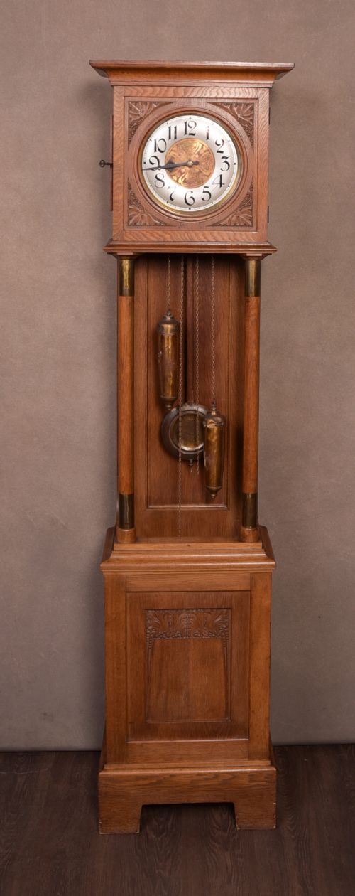 An Unusual Arts and Crafts Oak Long Case Clock