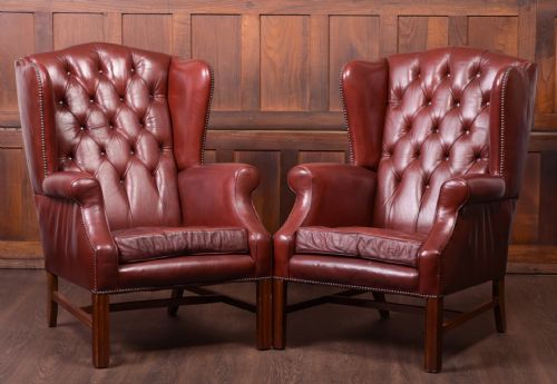 Edwardian Pair of Leather Chesterfield Wing Back Chairs