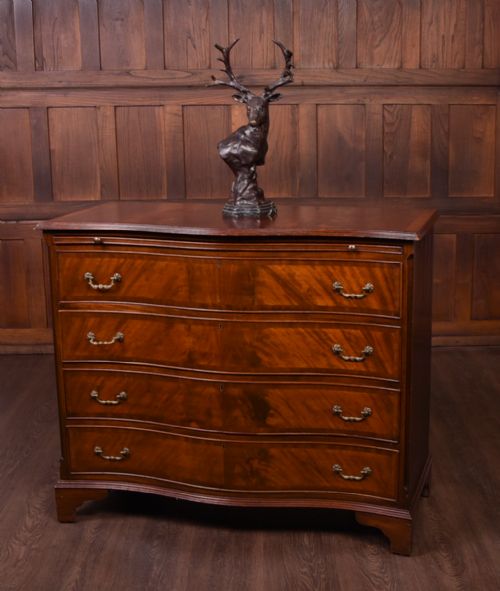 Edwardian Flame Mahogany Serpentine 4 Drawer Chest