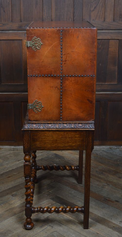 JACOBEAN STYLE LEATHER AND OAK CABINET - ADDITIONAL PHOTO 11