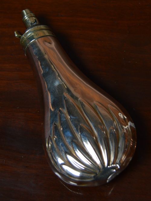 19TH CENTURY COPPER AND BRASS POWDER FLASK
