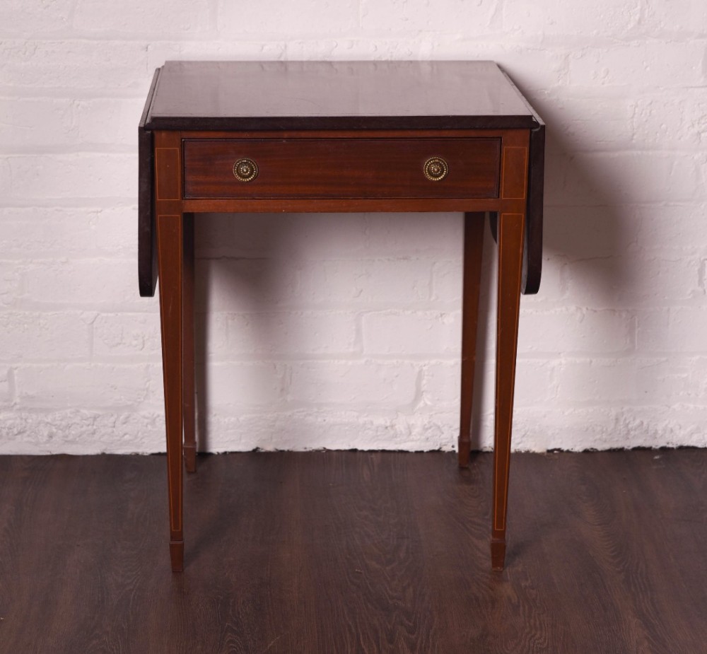 Mahogany drop leaf Pembroke table of small proportions 
