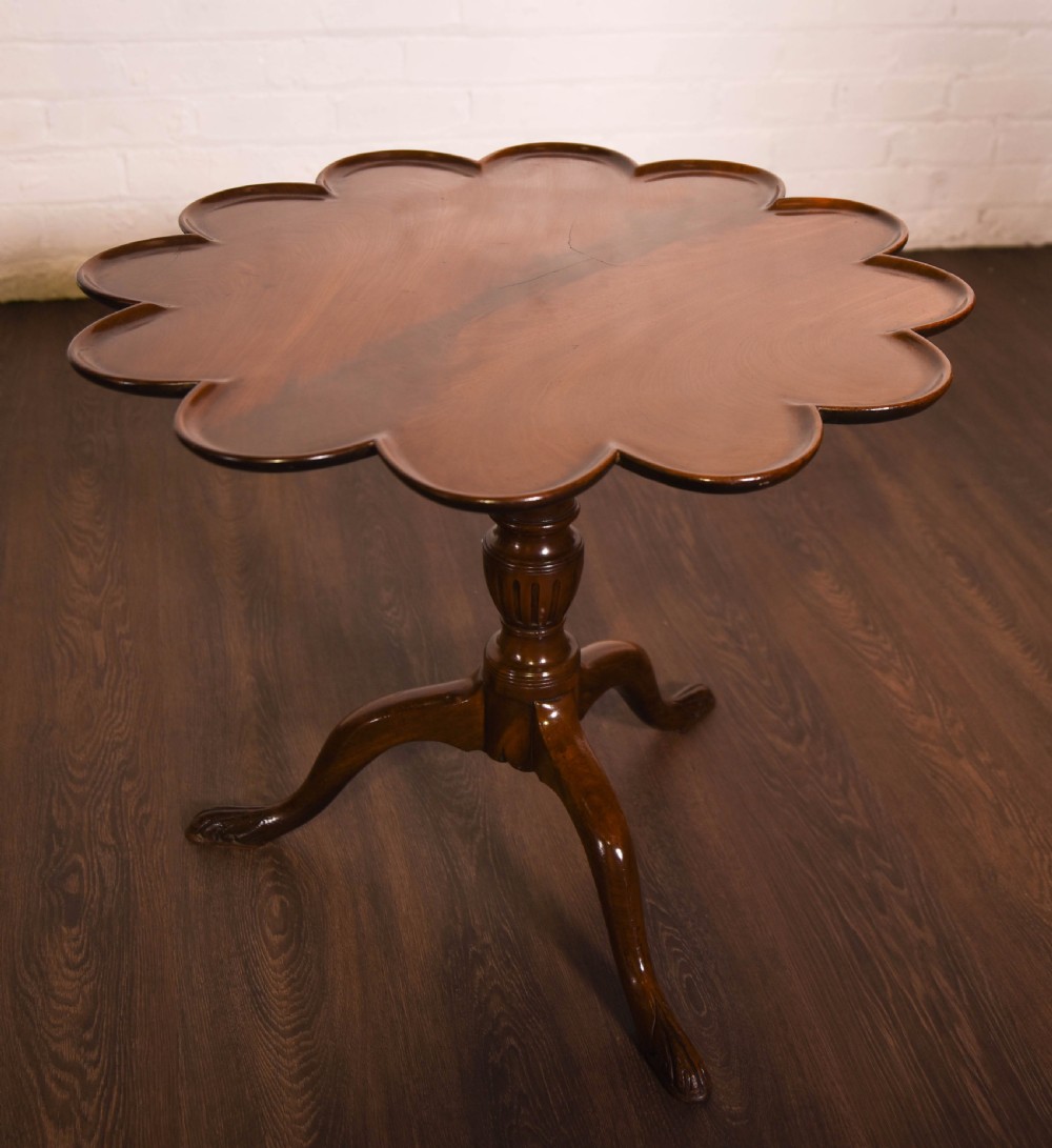 A mahogany tilt top tripod table  View V