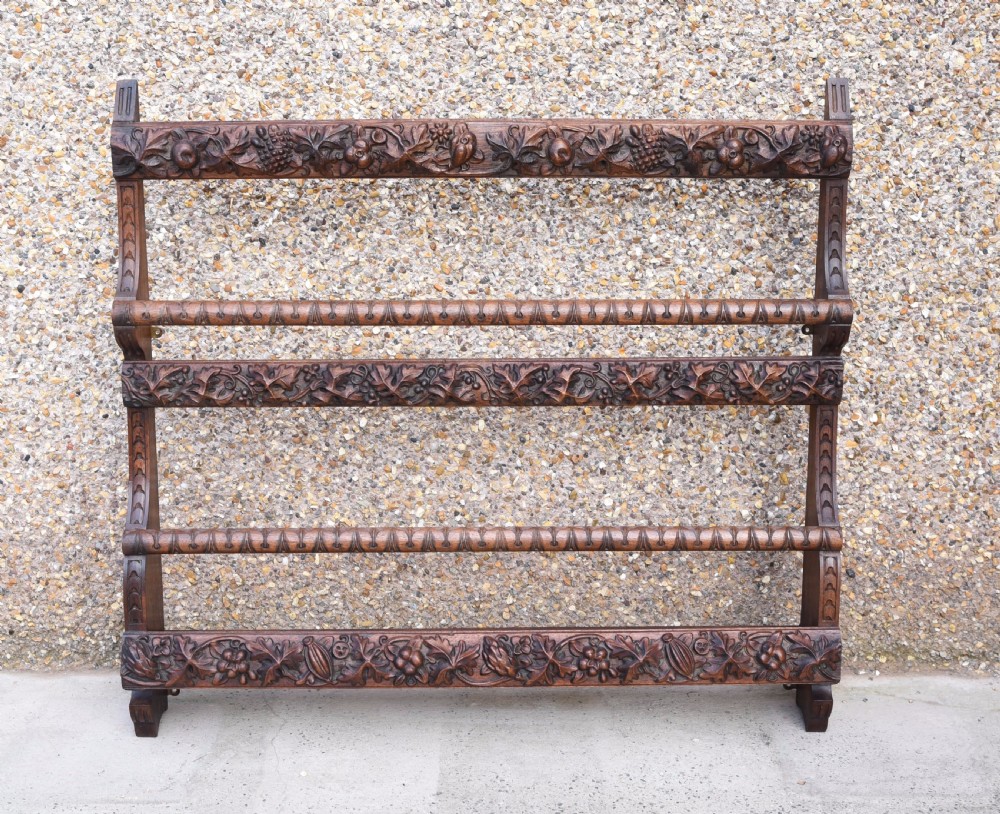 Carved oak plate rack 