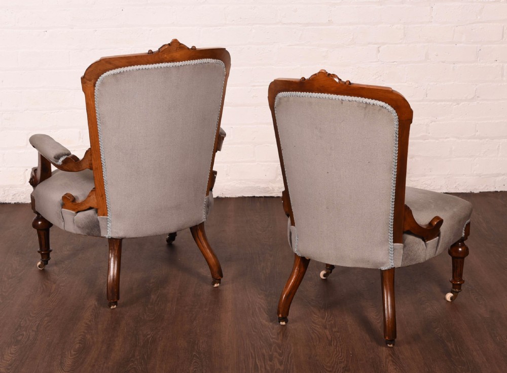 A matching pair of Walnut Victorian ladies and gents chairs View II
