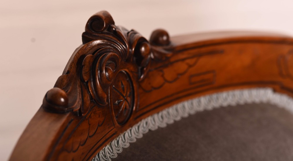 A matching pair of Walnut Victorian ladies and gents chairs View IV