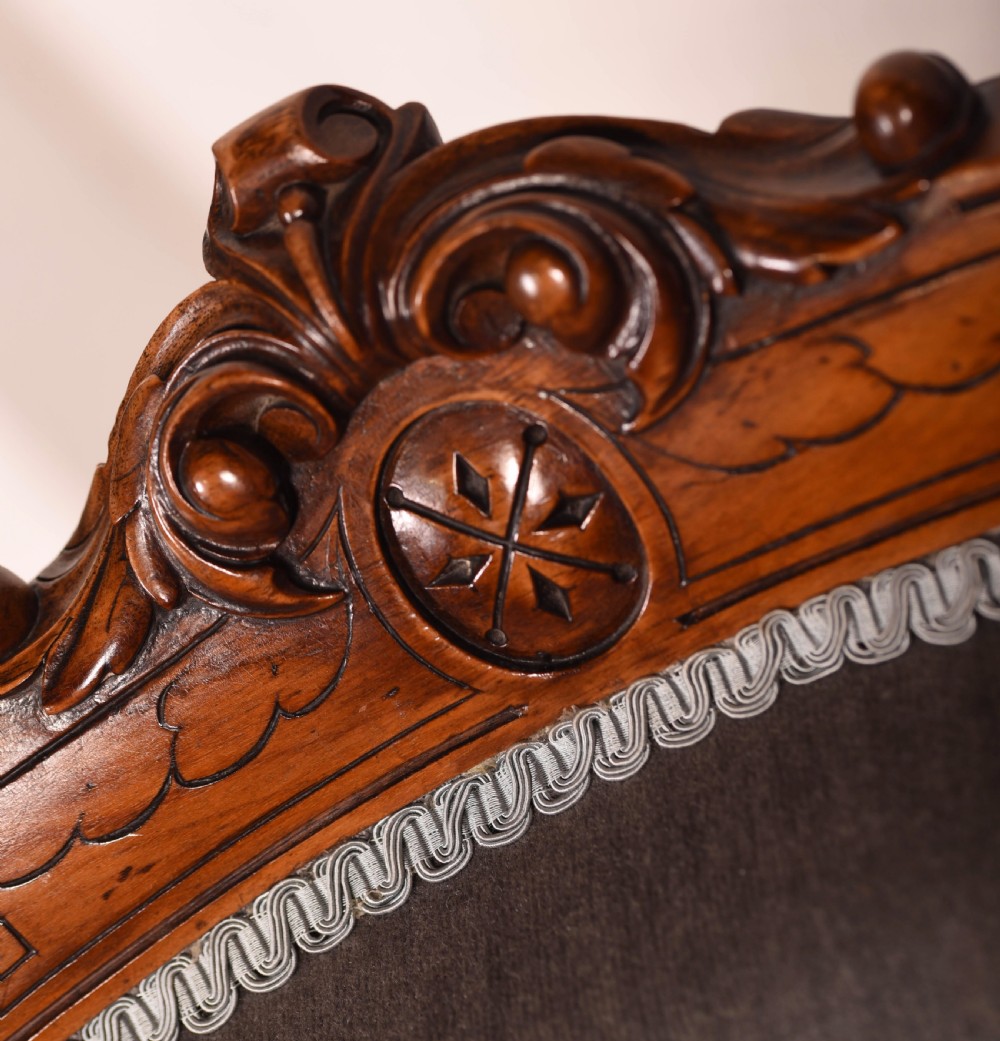 A matching pair of Walnut Victorian ladies and gents chairs View XI
